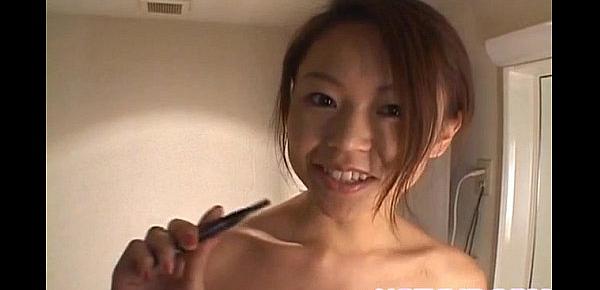  Risa Aihara sticks sex toys in her snatch